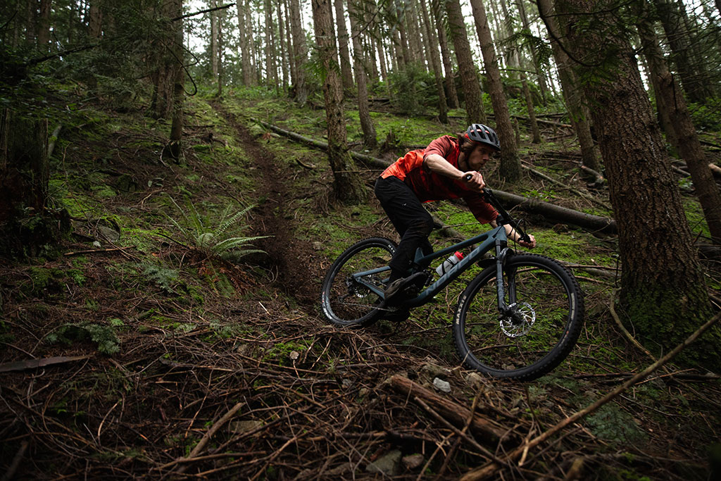 Adam Woodhouse riding a steep singletrail - photo by Bryden Rastad